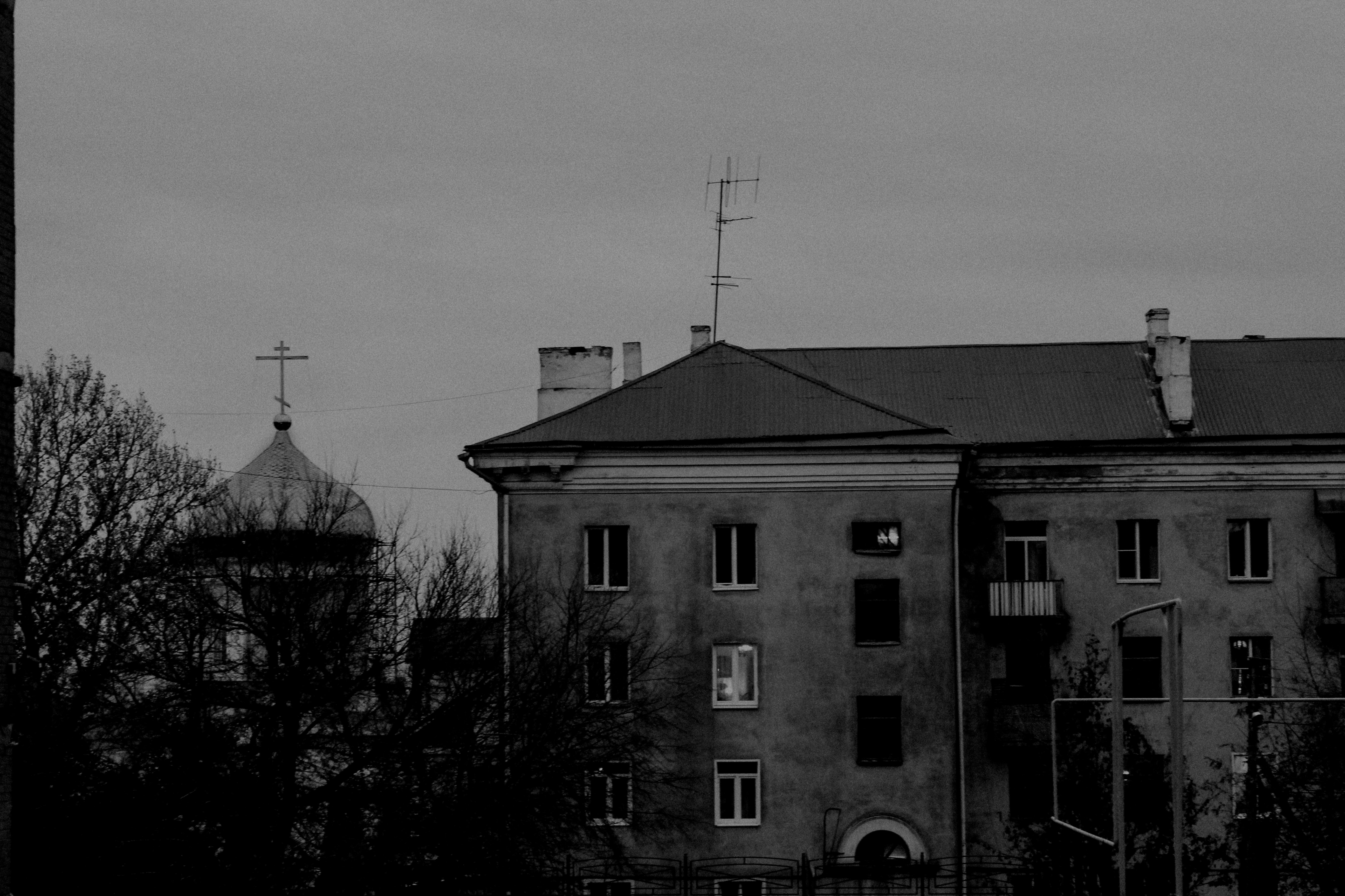 grayscale photo of concrete building